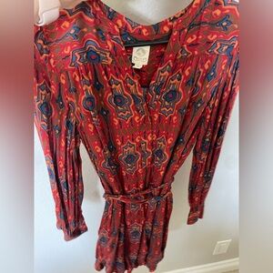 Anthropologie tunic dress brand is called Tiny